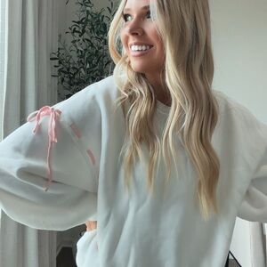 Elegant White Sweater with Pink Details